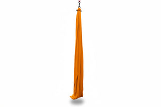 Orange Aerial Silk hanging from metal hardware