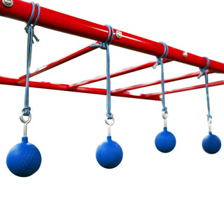 Blue round Ninja Grips hanging from a red Funky Monkey Bars monkey bar frame